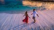 © Vadymation - Couple beach vacation sunset romantic love travel resort holiday ideal for honeymoon advertisements and lifestyle romance stories