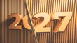 © ADDICTIVE STOCK - Golden background with the number 2027 for a celebration event