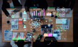 © InfiniteFlow - Business Professionals Analyzing Dynamics of Data with Technology Visualizations and Interactive Displays in Modern Workspace Fluxor.