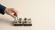 © KohXD - A person's hand touching a switch to represent business recovery planning as quick restoration of operations