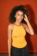 © Gonzalo Infiesta - Young black woman posing with curly hair