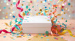 © mojebor - White gift box in the center with colorful paper confetti and party streamers falling down for a festive celebration and holiday birthday surprise event concept for your creative design