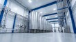 © Eduardo - Modern industrial food processing plant with stainless steel tanks and workers