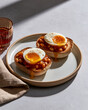 © Benjaporn - Mini egg and bean breakfast plate on stoneware showcasing GLP1 friendly protein fiber nutrition and luxury editorial wellness