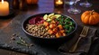 © ANJUMAAKTHER - Healthy autumn harvest bowl with roasted pumpkin kale avocado and grains served on a dark rustic table
