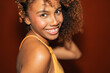 © Gonzalo Infiesta - Beautiful young woman with curly hair smiling