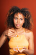 © Gonzalo Infiesta - Young woman applying under eye patches for skincare