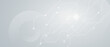 © kanpisut - Gray technology abstract background with white circuit lines and circular pattern.