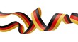 © MdAriful - Wavy ribbon with german flag colors isolated on white background
