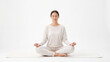 © Waseem - Meditation Background for Wellness Marketing with Woman in Lotus Yoga Pose on Clean White
