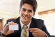 © IndiaPix - Businessman holding a business card