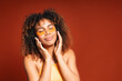 © Gonzalo Infiesta - Black woman relaxing with eye patches on face