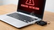 © Tromistudio  - Laptop overheating with external cooling fan on wooden desk with displaying overheating warning screen external black silver laptop technology electronic accessory computer