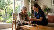 © Denisa - Caregiver Assisting Senior Woman with Cognitive Game at Home