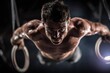 © nabakumar - powerful male gymnast doing iron cross on rings