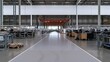 © Breezze - Central aisle of a modern manufacturing hall with red gantry beams and grey epoxy floors, featuring a functional industrial atmosphere for automation and logistics