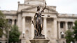 © Erta - Bronze Lady Justice statue blindfolded holding balanced scales of justice and sword on blurred bright bokeh background, law, justice, legal system