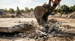© Dinar - Excavator bucket breaking reinforced concrete slab at demolition site. Heavy machinery demolishing foundation with rubble and rebar. Construction deconstruction and industrial destruction concept