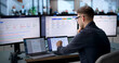 © Andrey Popov - Business Analyst Uses Laptop