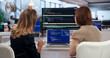 © Andrey Popov - Two Developers Side By Side Discussing Code Changes