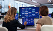 © Andrey Popov - Young Woman Shows Team How To Build Automated Workflow