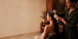 © Alexey - Woman receiving scalp massage from female beauty therapist in salon.
