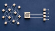 © MD ANWAR - Tangled White Strings With Scattered Wooden Blocks Converging Through a Target Cube and Emerging as Straight Arrows and Aligned Cubes Representing Process Streamlining and Strategic Business Alignment
