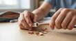 © Gates Studio - Close up of student hands sharpening a wooden pencil at a desk for school work or art project.