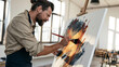 © CreativeArt - Male artist creating abstract painting on canvas in art studio, expressing creativity and inspiration