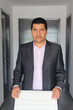 © Arlette - 40-year-old Latino executive with a dark skin, successful leader of his business and finance venture