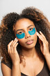 © Gonzalo Infiesta - Young woman applying under eye patches for skincare