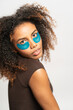 © Gonzalo Infiesta - Young woman applying under eye patches for self care