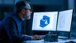 © twc - Professional engineer design industrial machine part using cad software on dual computer monitors in a modern development workshop studio lab