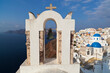 © Westend61 - Europe, Greece, Aegean Sea, Cyclades, Thira, Santorini, Oia, View of bell tower in front of the Caldera