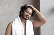 © Prostock-studio - Smiling Young Man With Towel On Shoulders After Shower, Enjoying Refreshing Moment In Modern Indoor Bathroom, Engaging In Personal Skincare Routine, Wellness And Self-care Concept.