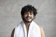 © Prostock-studio - Happy Smiling Young Man With Curly Hair Wearing A Towel At Home, Standing In The Bathroom, Showing Excitement While Engaging In Skincare Routine, Indoor Setting. Skincare Concept.