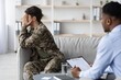 © Prostock-studio - Worried Male Soldier Reflecting Emotions While Engaged In Therapy Session With Therapist In Office, Seeking Support And Guidance For Mental Health Challenges, Focused On Healing Process.
