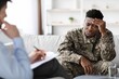 © Prostock-studio - Worried Black Male Soldier Expressing Concern While Talking With Therapist In Office Setting. Discussing Emotions And Challenges To Seek Support And Guidance From Professional For Mental Health.