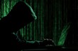 © Rose - Hooded figure typing on laptop with green binary code background
