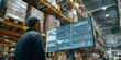 © Fahroni - Warehouse manager monitoring AI powered logistics dashboard on large digital screens inside a distribution center, analyzing inventory and supply chain data to improve operational efficiency
