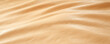 © saichon - Soft beige fabric texture with gentle folds and smooth surface creating warm and cozy feeling in image