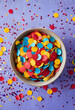 © Pixel-Shot - Celebration and party with colorful confetti in a bowl, festive background for events and holidays