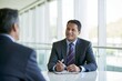 © Solid Tech - Two businessmen discussing corporate strategy during a meeting in a bright boardroom