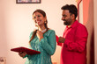 © IndiaPix - Couple sharing a joyful moment at home