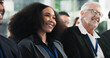 © peopleimages.com - Woman, smile or audience in conference for business, career development or finance course. Employee, crowd or attention in seminar for company training, financial advice or happy for upskill workshop