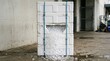 © Vadym - Broken white styrofoam shipping box spilling clear ice cubes onto wet concrete floor