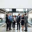 © Marisa - Diverse Business Team Collaborating And Looking Upwards In Modern Office