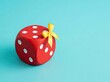 © irvan - Red die tied with a yellow bow on blue background suitable for casino promotions symbolizing lucky surprise reward and unexpected fortune