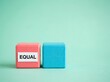 © irvan - Pink and blue wooden blocks with an EQUAL label ideal for diversity and social campaigns symbolizing gender equality balance and human rights