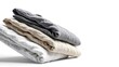 © Vibu design  gallery - Stack of Folded Towels and Linens for Spa or Hotel Decor
